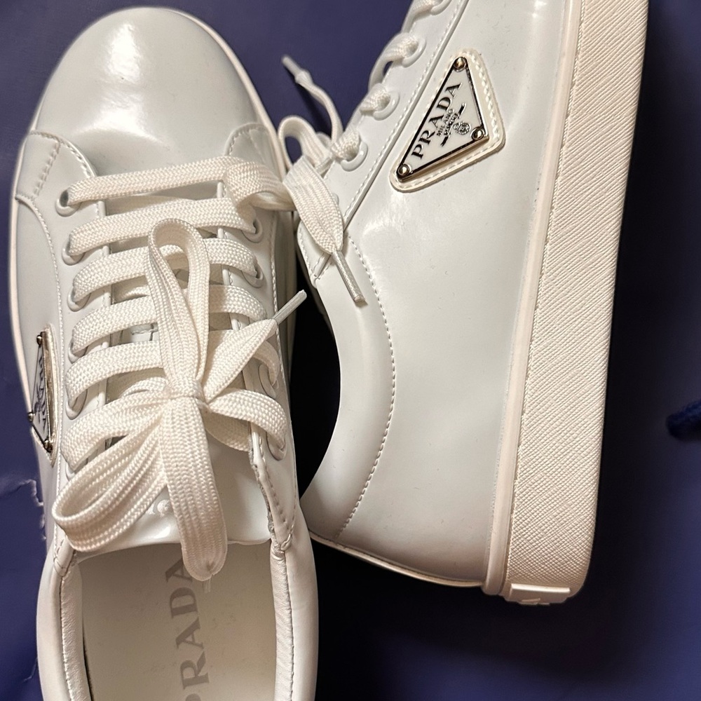 Prada White Leather Sneakers with Classic Low-Top Design